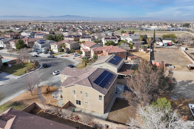 drone / aerial view featuring a mountain view