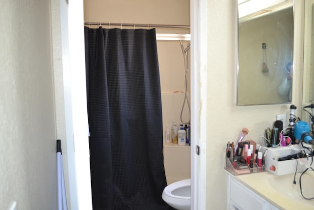 bathroom featuring vanity and walk in shower