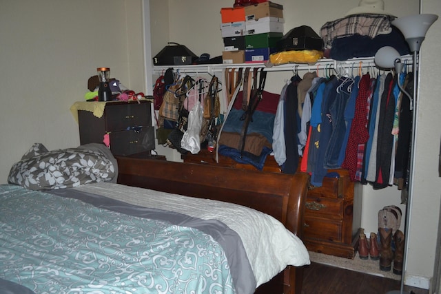 bedroom featuring wood-type flooring