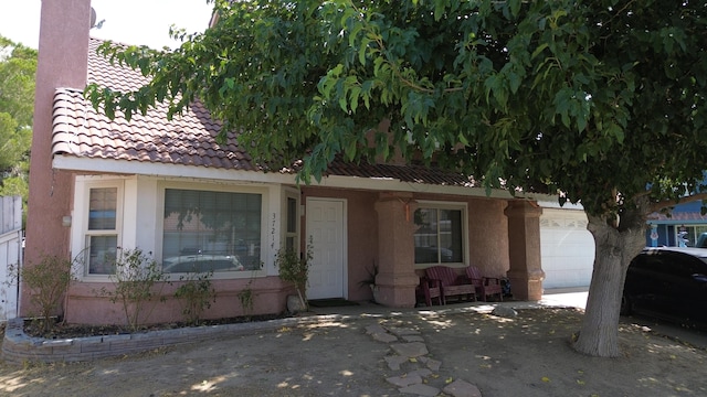 view of front of property with a garage