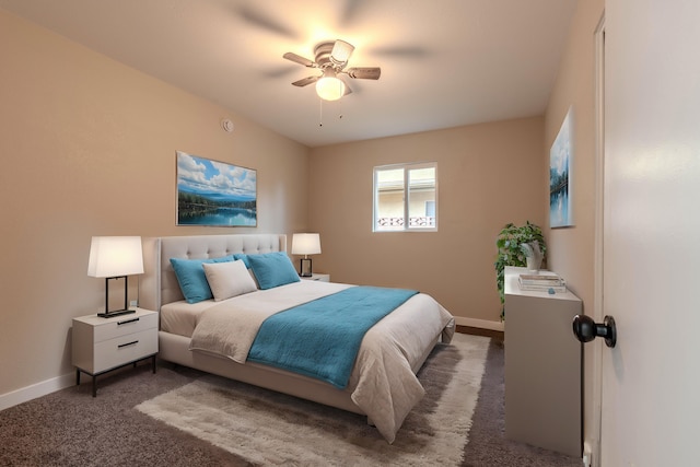 bedroom with carpet floors, ceiling fan, and baseboards