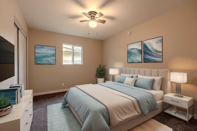 bedroom with carpet floors, a closet, a ceiling fan, and baseboards