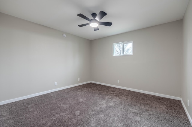 unfurnished room featuring ceiling fan, carpet flooring, and baseboards