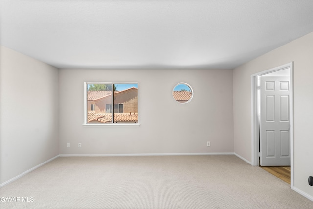 43441 W 30th St Unit 3, Lancaster, CA 93536 - unfurnished room with light carpet and baseboards