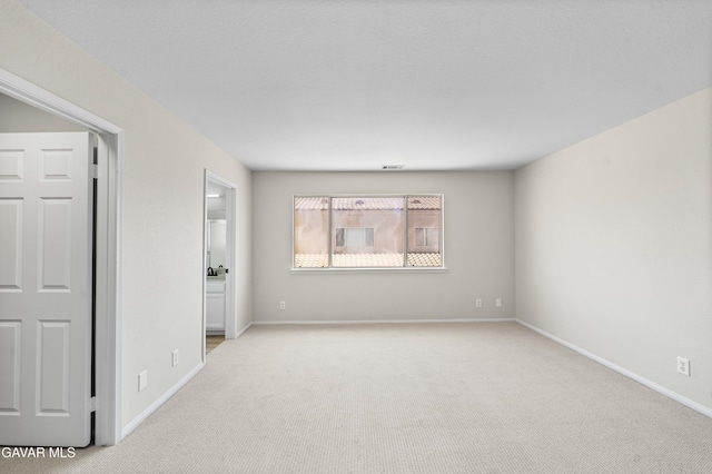 43441 W 30th St Unit 3, Lancaster, CA 93536 - carpeted spare room with baseboards