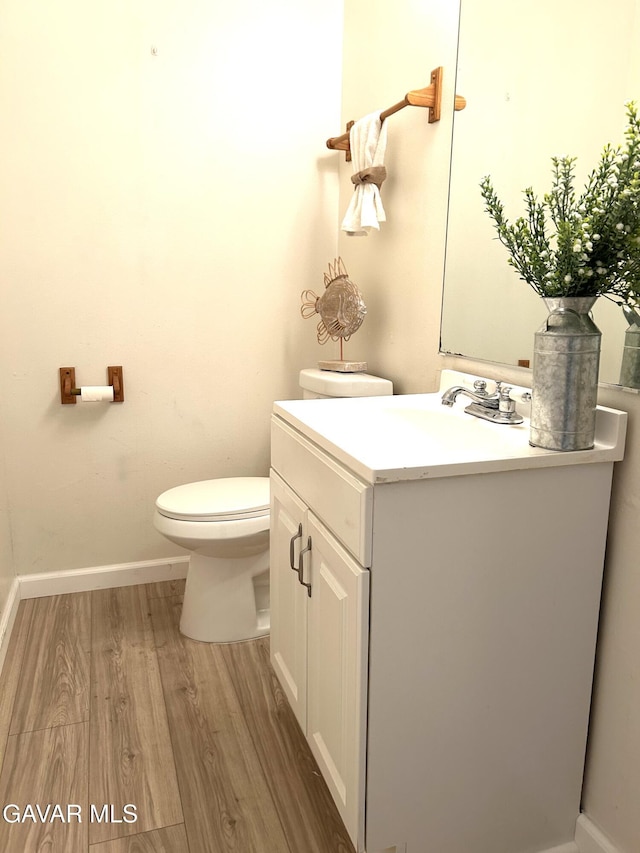 38710 E 10th St Unit 12, Palmdale, CA 93550 - bathroom with wood finished floors and vanity