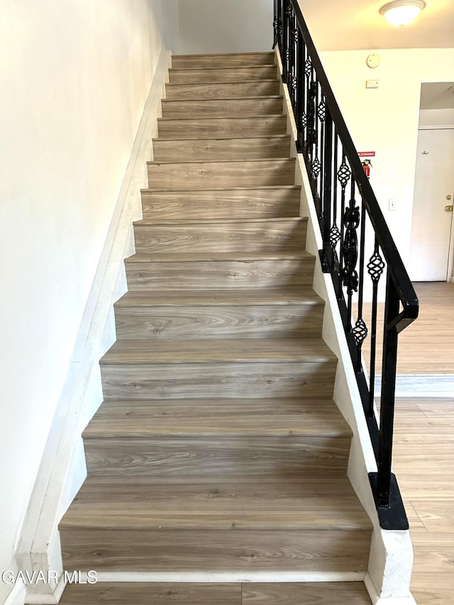 38710 E 10th St Unit 12, Palmdale, CA 93550 - stairs with wood finished floors