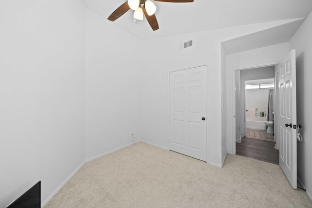 2908 Owens Way, Rosamond, CA 93560 - unfurnished bedroom featuring light colored carpet, baseboards, a ceiling fan, and lofted ceiling