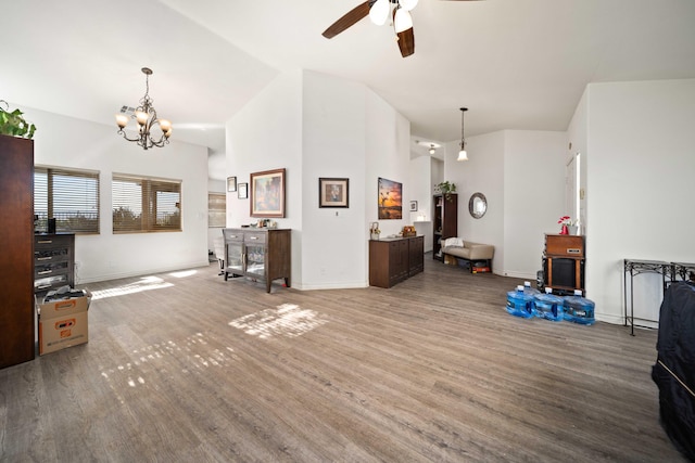2908 Owens Way, Rosamond, CA 93560 - living area featuring wood finished floors, baseboards, a ceiling fan, a chandelier, and high vaulted ceiling