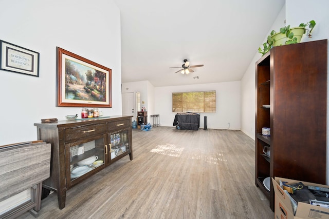 2908 Owens Way, Rosamond, CA 93560 - living room with a ceiling fan, wood finished floors, lofted ceiling, and baseboards