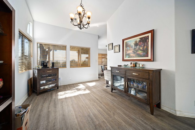 2908 Owens Way, Rosamond, CA 93560 - foyer entrance featuring a chandelier, wood finished floors, baseboards, healthy amount of natural light, and a towering ceiling