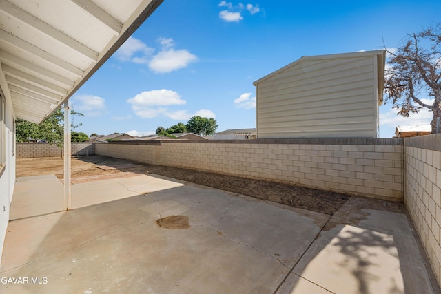 2465 W 55th St, Rosamond, CA 93560 - fenced backyard featuring a patio area