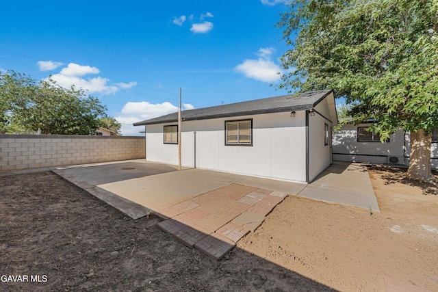 2465 W 55th St, Rosamond, CA 93560 - rear view of property with a patio