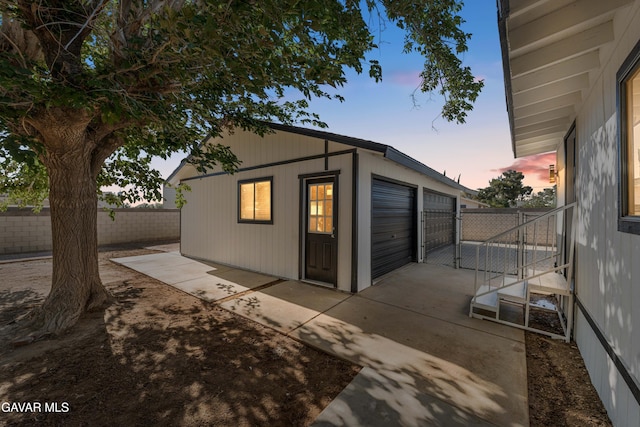 2465 W 55th St, Rosamond, CA 93560 - view of garage at dusk