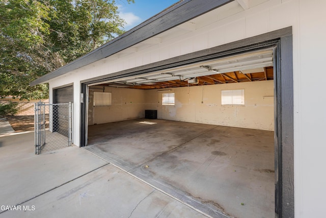 2465 W 55th St, Rosamond, CA 93560 - garage featuring a garage door opener