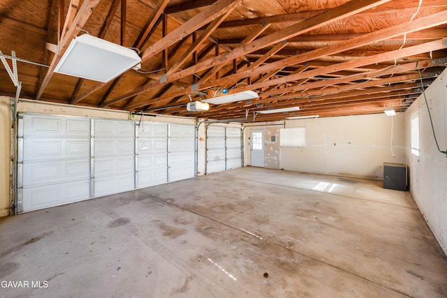 2465 W 55th St, Rosamond, CA 93560 - garage featuring a garage door opener