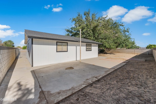 2465 W 55th St, Rosamond, CA 93560 - back of house featuring a patio area and a fenced backyard