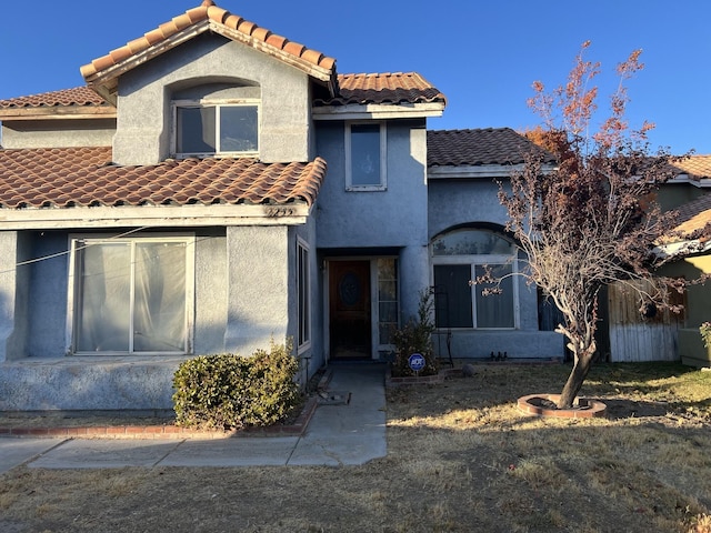 view of front of home with a front lawn