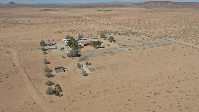 drone / aerial view featuring a mountain view