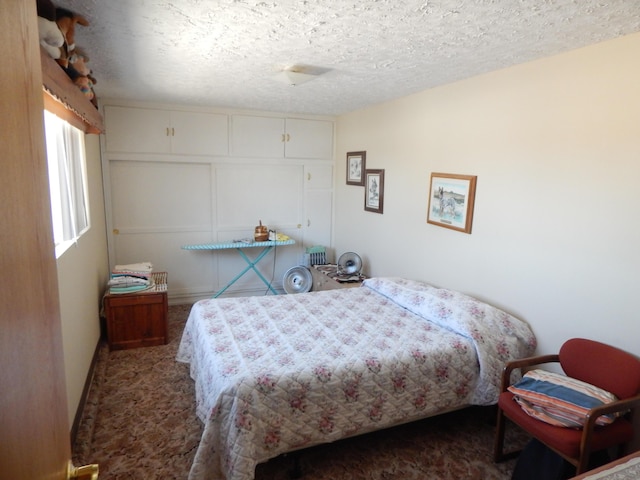 bedroom with a textured ceiling