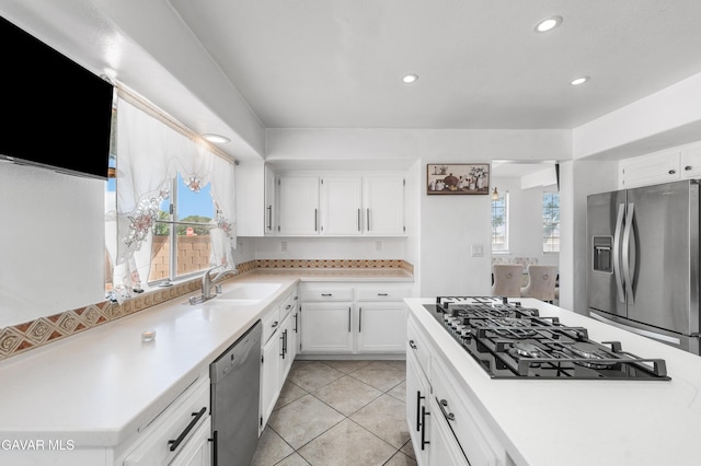 44559 Aspen St, Lancaster, CA 93535 - kitchen with appliances with stainless steel finishes, light countertops, recessed lighting, and white cabinetry