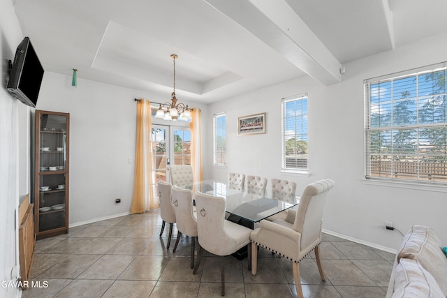 44559 Aspen St, Lancaster, CA 93535 - dining space with a chandelier, light tile patterned flooring, and a tray ceiling
