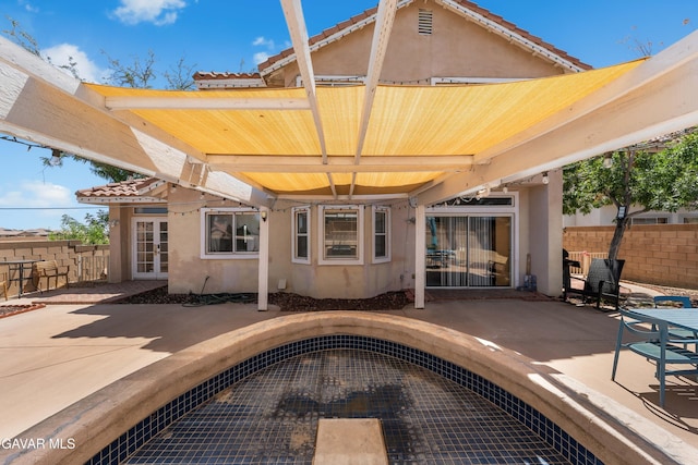 44559 Aspen St, Lancaster, CA 93535 - back of property with stucco siding, a patio area, and a tiled roof