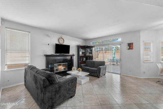 44559 Aspen St, Lancaster, CA 93535 - living room with light tile patterned floors and a tiled fireplace