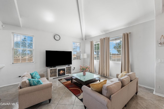 44559 Aspen St, Lancaster, CA 93535 - living area with plenty of natural light, light tile patterned floors, and a lit fireplace
