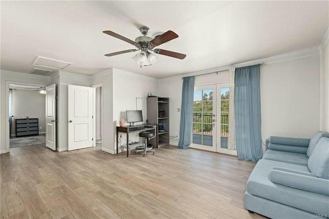 office featuring light wood finished floors, attic access, baseboards, crown molding, and french doors