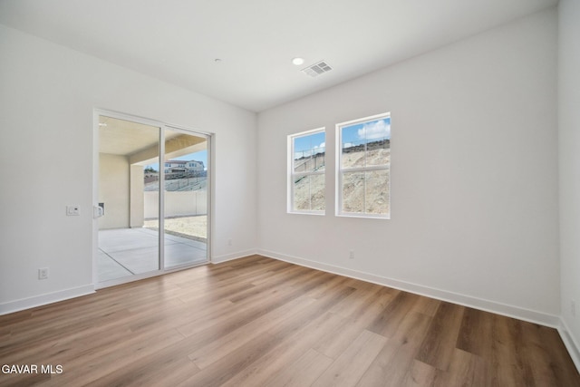 3716 Eliopulos Ranch Dr, Palmdale, CA 93551 - spare room featuring light wood finished floors and baseboards