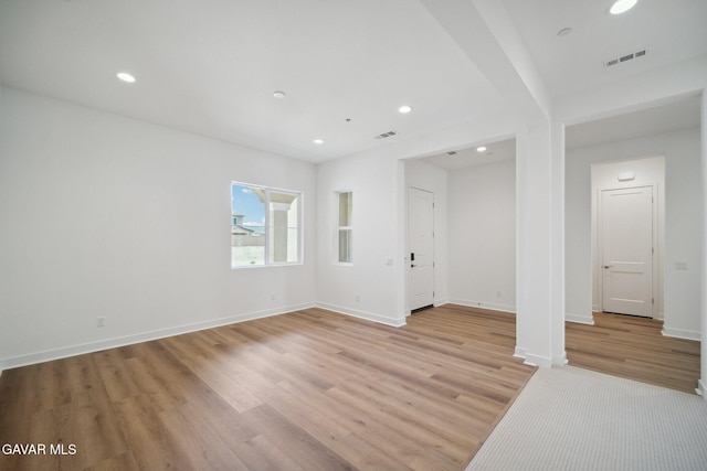 3716 Eliopulos Ranch Dr, Palmdale, CA 93551 - empty room with light wood-style flooring and recessed lighting