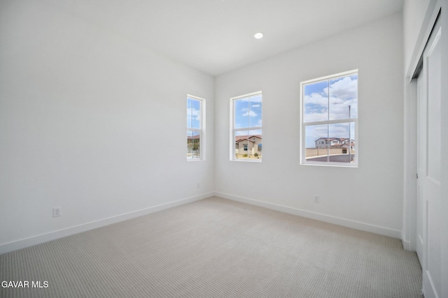 3716 Eliopulos Ranch Dr, Palmdale, CA 93551 - unfurnished bedroom featuring light colored carpet, recessed lighting, and a closet