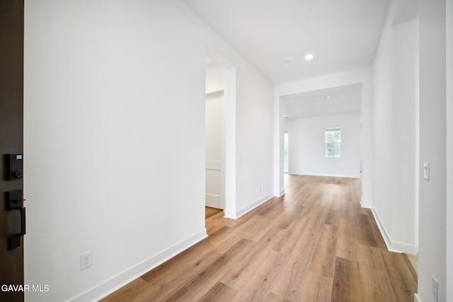 3716 Eliopulos Ranch Dr, Palmdale, CA 93551 - hallway with light wood-type flooring and recessed lighting
