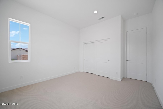 3716 Eliopulos Ranch Dr, Palmdale, CA 93551 - unfurnished bedroom with light colored carpet, a closet, and recessed lighting