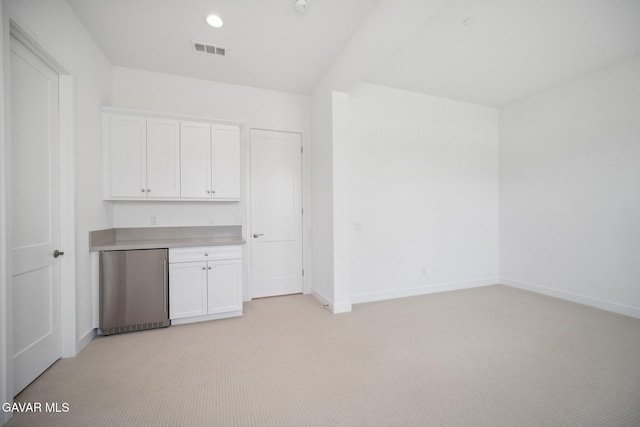 3716 Eliopulos Ranch Dr, Palmdale, CA 93551 - bar area featuring refrigerator and light colored carpet