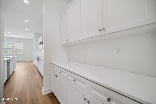 3716 Eliopulos Ranch Dr, Palmdale, CA 93551 - kitchen featuring light wood finished floors, white cabinetry, light countertops, recessed lighting, and dishwasher