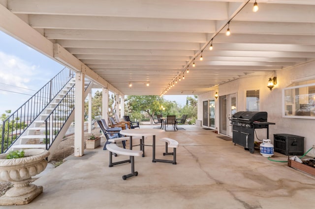 36755 Tierra Subida Ave, Palmdale, CA 93551 - view of patio / terrace featuring stairway, outdoor dining area, and area for grilling