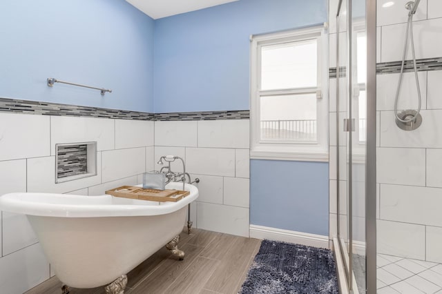 36755 Tierra Subida Ave, Palmdale, CA 93551 - bathroom featuring tile walls, a shower stall, and a freestanding bath