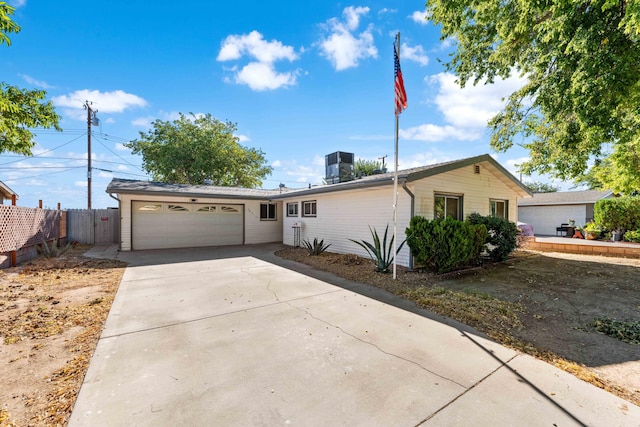 single story home featuring a garage