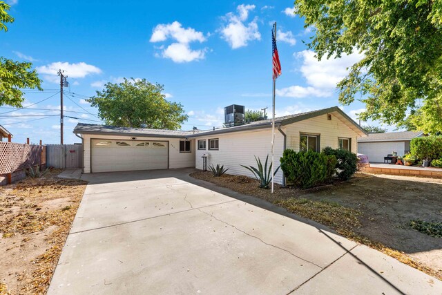 single story home featuring a garage