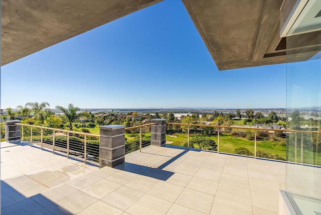 view of patio with a balcony