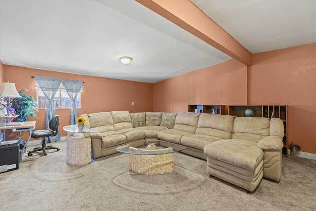 carpeted living area featuring vaulted ceiling with beams and baseboards