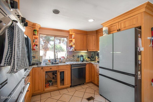 809 Berncastle Rd, Acton, CA 93510 - kitchen featuring dishwashing machine, freestanding refrigerator, open shelves, light stone counters, and light tile patterned flooring