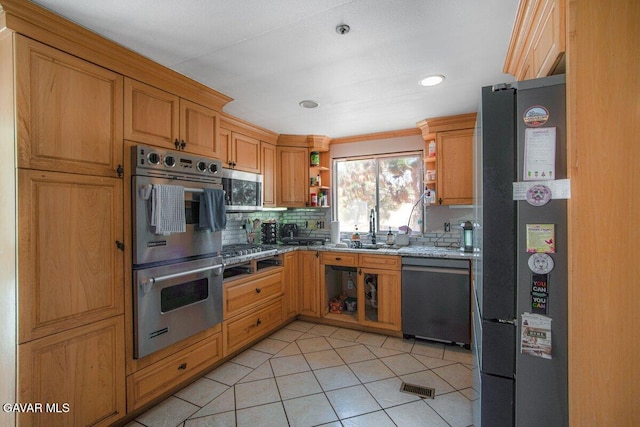 809 Berncastle Rd, Acton, CA 93510 - kitchen featuring stainless steel appliances, open shelves, light tile patterned floors, tasteful backsplash, and light stone counters
