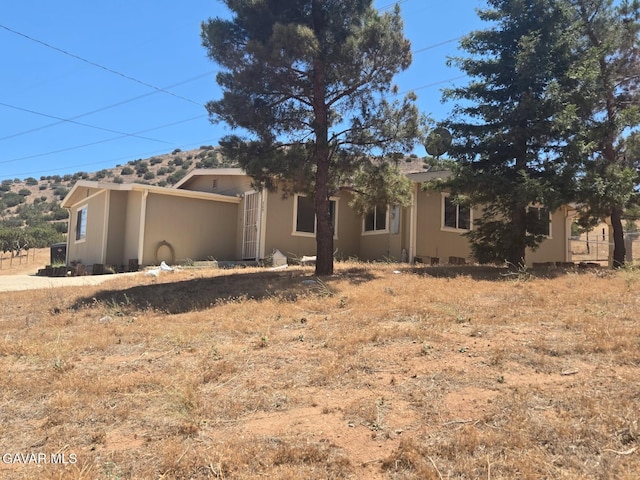 809 Berncastle Rd, Acton, CA 93510 - view of front of house featuring stucco siding