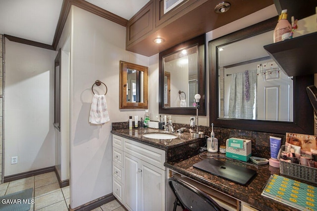 809 Berncastle Rd, Acton, CA 93510 - bathroom featuring ornamental molding, vanity, and tile patterned flooring