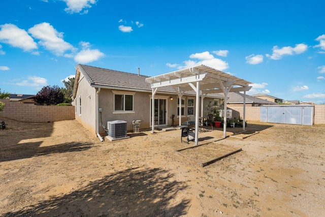 7150 Lyric Ave, Lancaster, CA 93536 - rear view of property featuring central air condition unit, a gate, a pergola, a patio area, and a fenced backyard