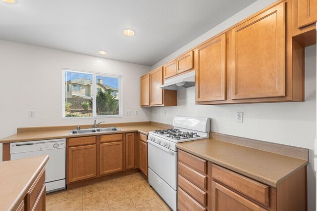7150 Lyric Ave, Lancaster, CA 93536 - kitchen featuring white appliances, under cabinet range hood, a sink, recessed lighting, and light countertops