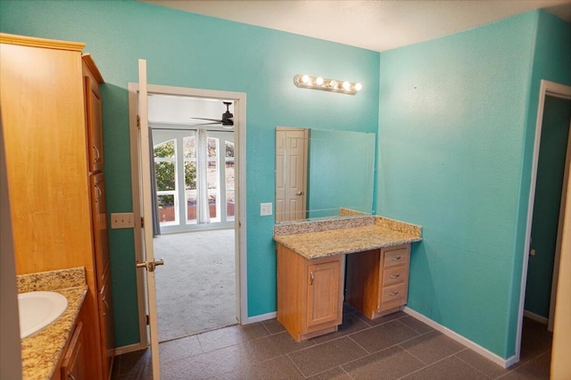 12332 E Ave X, Pearblossom, CA 93553 - bathroom with vanity, ceiling fan, and tile patterned flooring